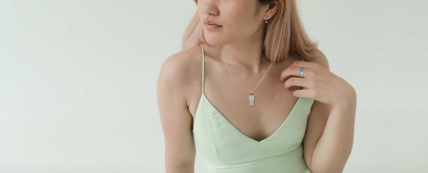 woman wearing memorial jewellery